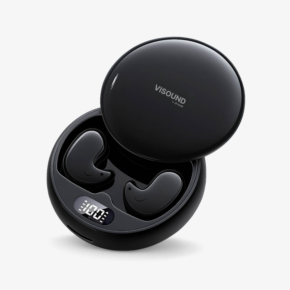 Visound by O Vrong wireless earbuds in an open black round charging case featuring two comma-shaped earpieces with subtle smiley faces and a digital "100" battery display against a clean white background